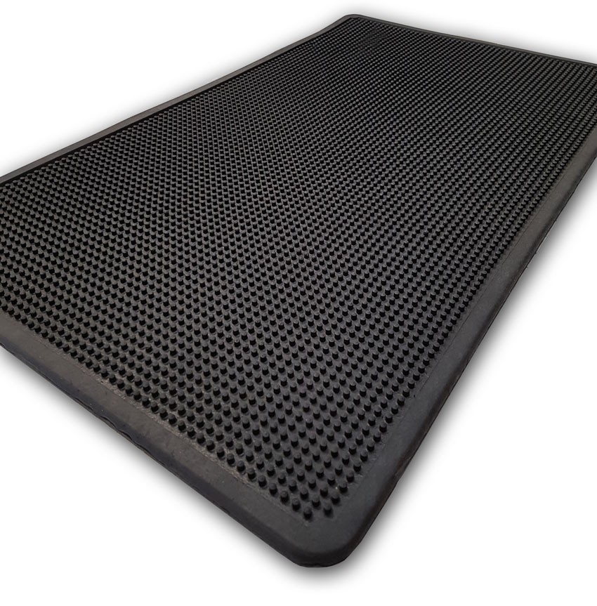 Tapis à picots et bords arrondis 